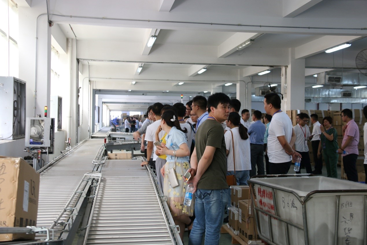 EVO视讯常务副总裁王雷：“新零售环境下的物流中心规划”主题分享 | UR服饰物流中心迎百余服装物流经理人现场参观